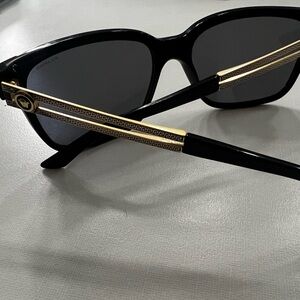 Versace Women's Sunglasses with Black Frame and Gold Detailing